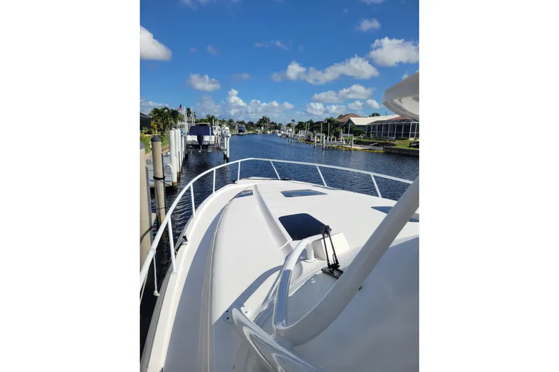 Previous Freshwater !! Yacht Photos Pics 2016 Intrepid 475 Sport Yacht cruising on a sunny day, canal view.