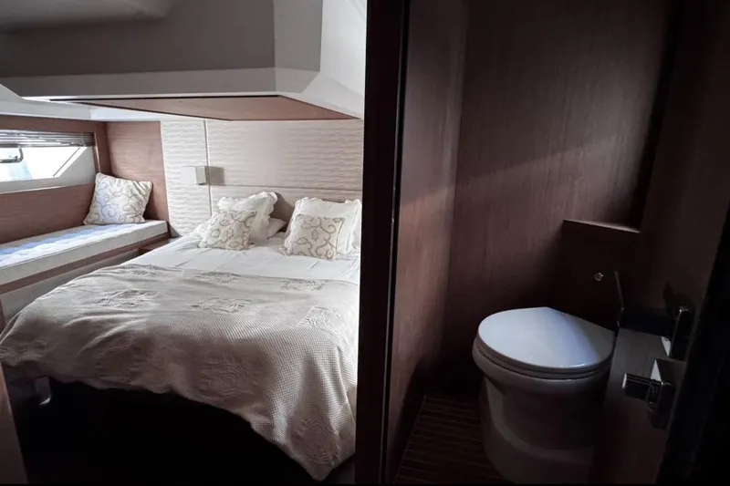  Yacht Photos Pics Luxurious bedroom and bathroom in 2018 Beneteau Gran Turismo 50 Sportfly yacht.