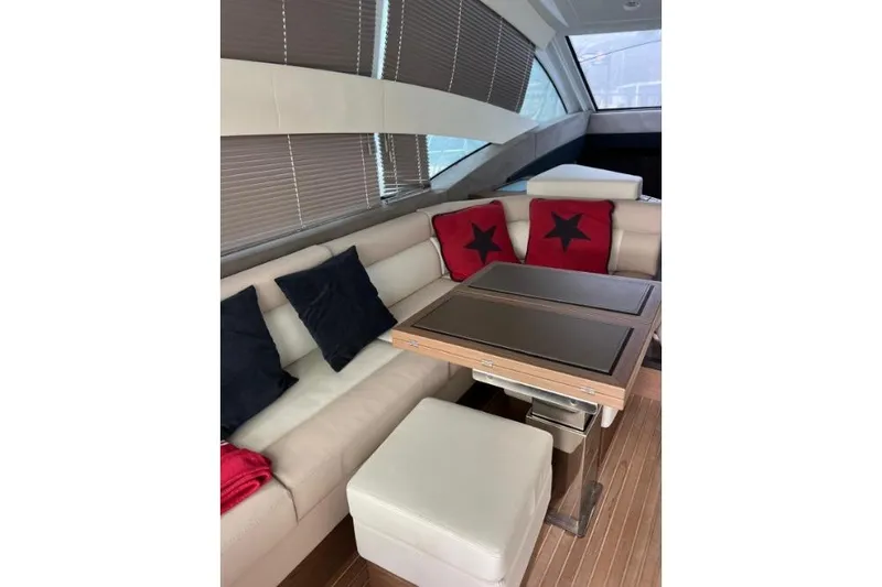  Yacht Photos Pics Luxurious interior of 2018 Beneteau Gran Turismo 50 Sportfly with plush seating and stylish decor.