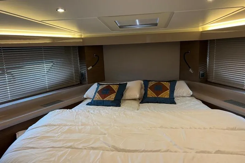  Yacht Photos Pics Luxurious bedroom interior of 2018 Beneteau Gran Turismo 50 Sportfly yacht.