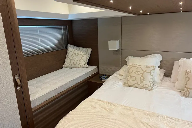  Yacht Photos Pics Luxurious bedroom interior of 2018 Beneteau Gran Turismo 50 Sportfly yacht with elegant decor.