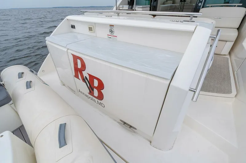  Yacht Photos Pics 2021 Tiara Yachts F44 Flybridge with R&B logo, Annapolis, MD, docked by the water.