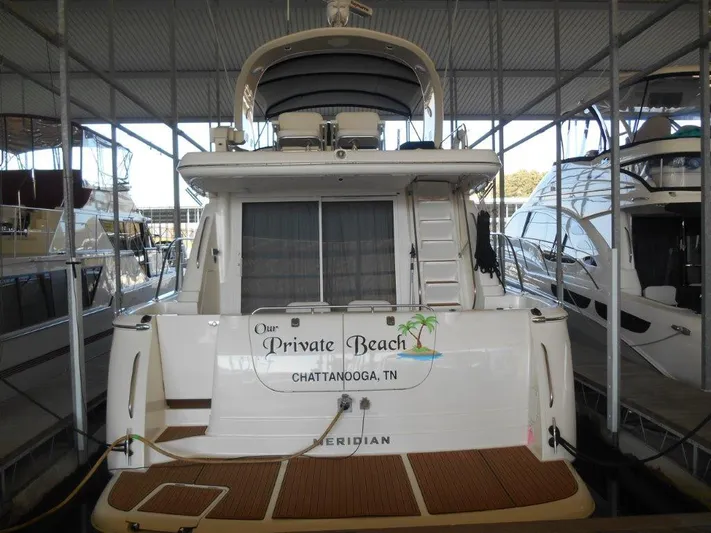  Yacht Photos Pics 2004 Meridian 540 Pilothouse yacht docked, named "Our Private Beach," Chattanooga, TN.