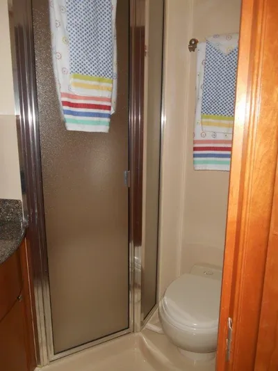  Yacht Photos Pics Bathroom in 2004 Meridian 540 Pilothouse yacht with shower and toilet.