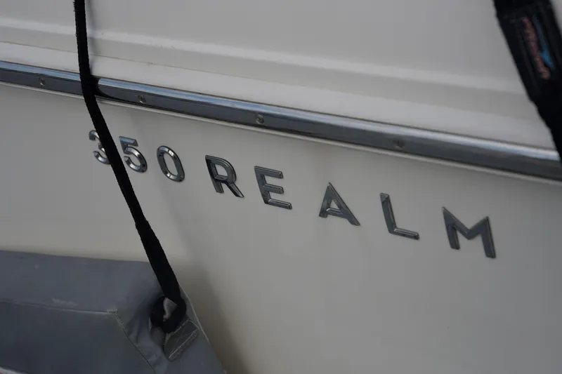  Yacht Photos Pics Close-up of 2020 Boston Whaler 350 Realm boat nameplate.