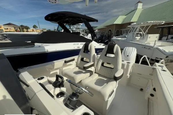 242-934 Yacht Photos Pics 2024 Sailfish 242 CC boat interior with dual seats and modern design.