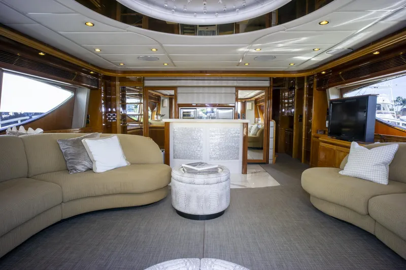 Paladin Yacht Photos Pics Luxurious interior of a 2000 Ferretti Yachts Custom Line 94, featuring elegant seating and modern decor.