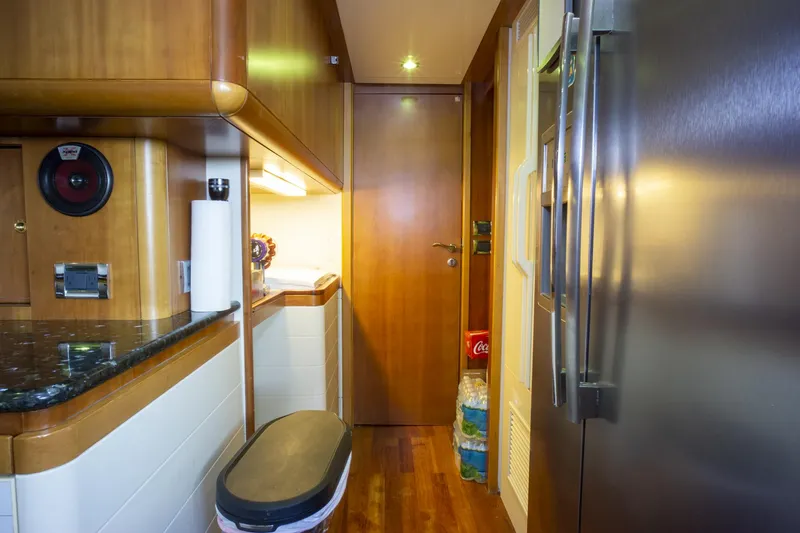 Paladin Yacht Photos Pics Interior of 2000 Ferretti Yachts Custom Line 94, featuring modern kitchen amenities.
