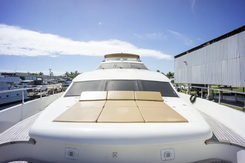 Paladin Yacht Photos Pics Ferretti Yachts Custom Line 94, 2000 model, luxury yacht exterior under clear blue sky.