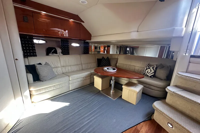 Navion Yacht Photos Pics Luxurious interior of 2001 Sea Ray 510 Sundancer yacht with plush seating and elegant decor.