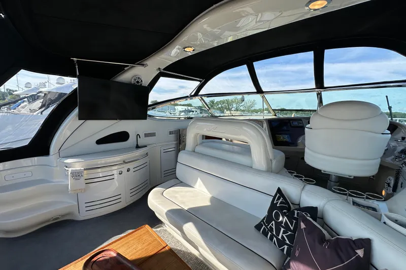Navion Yacht Photos Pics Luxurious interior of 2001 Sea Ray 510 Sundancer yacht with plush seating and modern amenities.