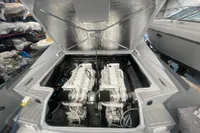 Engine compartment of a 2008 SACS Strider boat with dual engines visible.