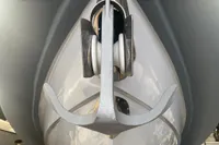 Close-up of a 2008 SACS Strider boat anchor and bow detail.