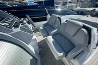 Luxury seating on 2008 SACS Strider boat with modern dashboard and controls.