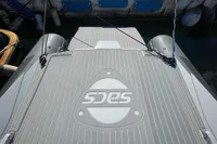2008 SACS Strider boat deck with logo, featuring sleek design and durable materials.