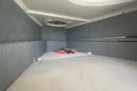 2008 SACS Strider interior cabin with gray upholstery and life jacket.