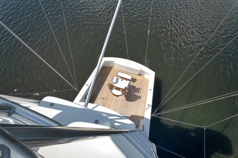 Sparkle Plenty Yacht Photos Pics Aerial view of 2009 Gamefisherman Express boat deck on water.