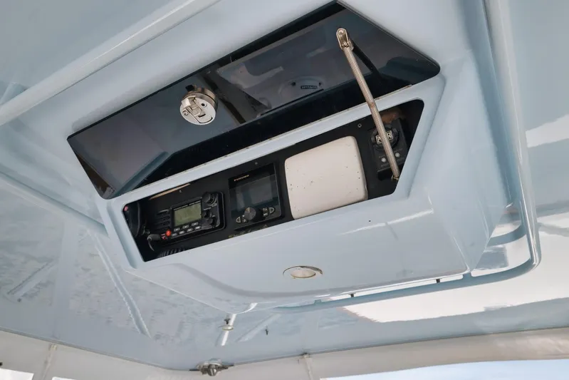 Sparkle Plenty Yacht Photos Pics 2009 Gamefisherman Express boat electronics panel with radio and navigation equipment.