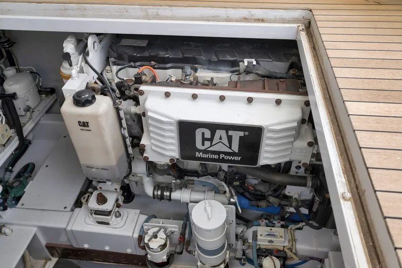 Sparkle Plenty Yacht Photos Pics Engine compartment of a 2009 Gamefisherman Express with CAT Marine Power engine.