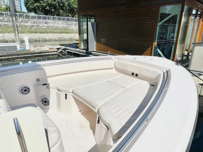  Yacht Photos Pics 2014 Grady-White Canyon 306 boat with spacious seating and modern design.