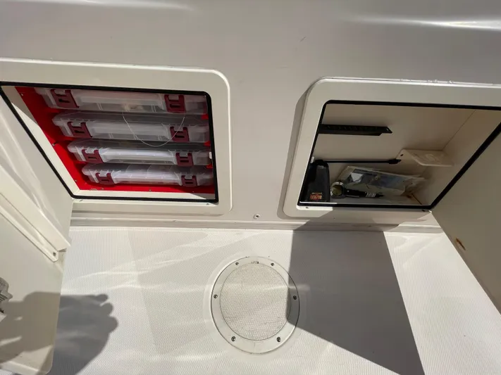  Yacht Photos Pics Storage compartments on a 2014 Grady-White Canyon 306 boat deck.