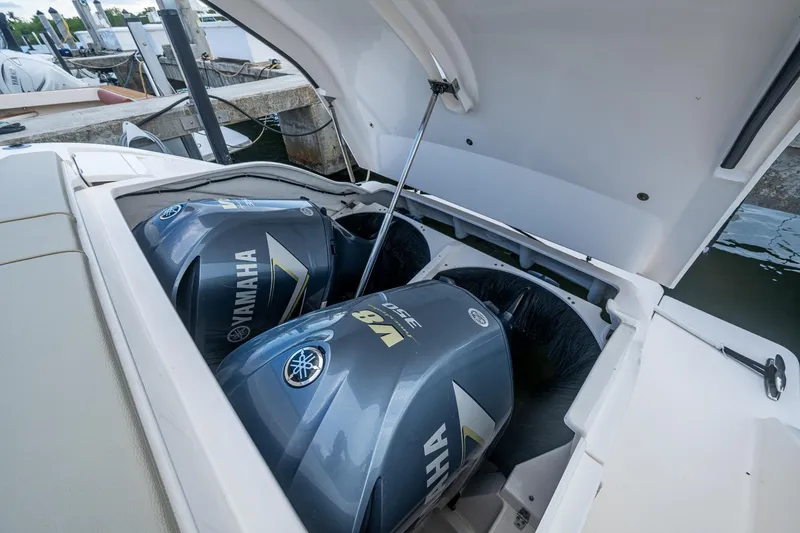  Yacht Photos Pics 2018 Pursuit SC 365i Sport Coupe with Yamaha V8 engines at dock.