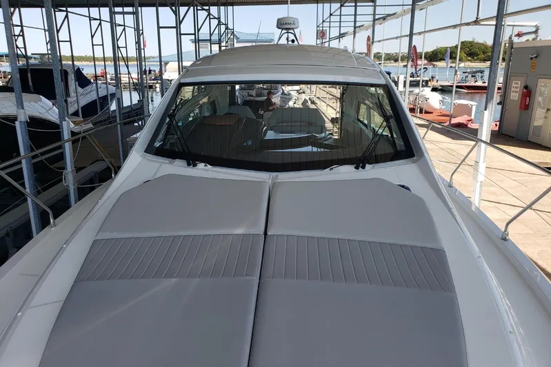 Tu Madre Yacht Photos Pics 2019 Beneteau Gran Turismo 46 yacht docked, showcasing sleek design and spacious deck.