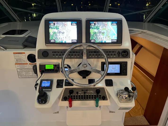  Yacht Photos Pics 2011 Rampage 34 IPS boat helm with dual navigation screens and control panel.