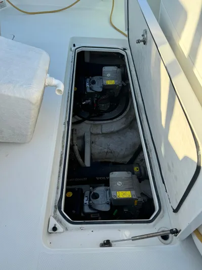  Yacht Photos Pics 2011 Rampage 34 IPS engine compartment with visible machinery and components.
