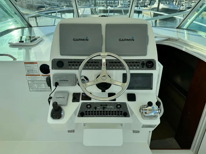  Yacht Photos Pics Helm of 2011 Rampage 34 IPS boat with Garmin navigation displays.