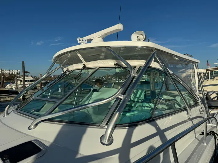  Yacht Photos Pics 2011 Rampage 34 IPS boat with sleek design and sturdy windshield.