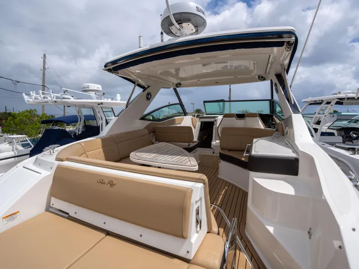 Soiral V Yacht Photos Pics 2021 Sea Ray 320 Sundancer boat with spacious seating and modern design.