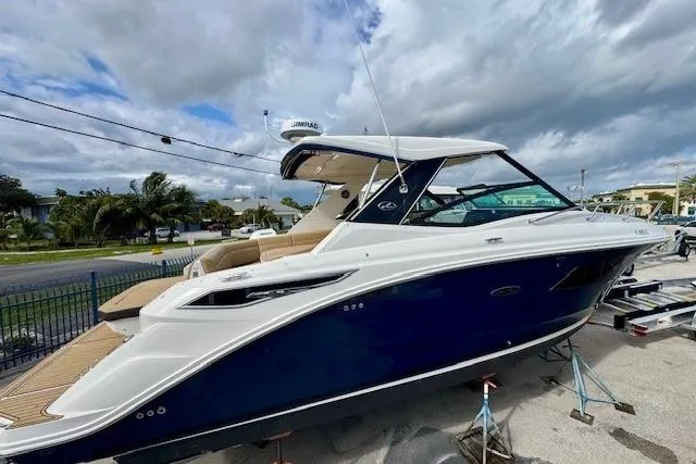 Soiral V Yacht Photos Pics 2021 Sea Ray 320 Sundancer boat on display, featuring sleek design and modern amenities.