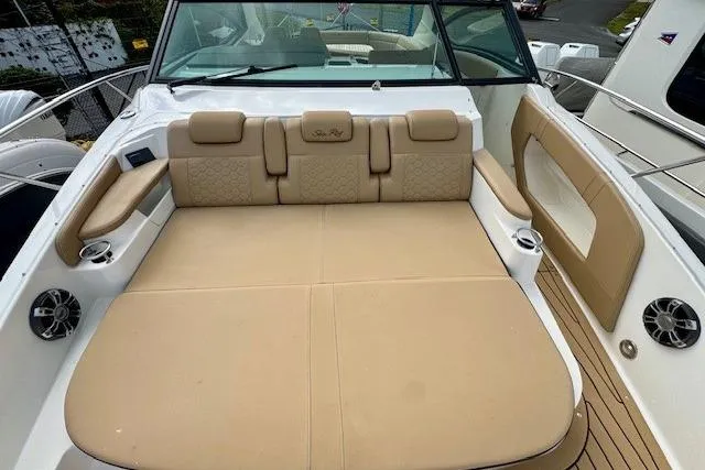 Soiral V Yacht Photos Pics 2021 Sea Ray 320 Sundancer boat with spacious tan seating and cup holders.
