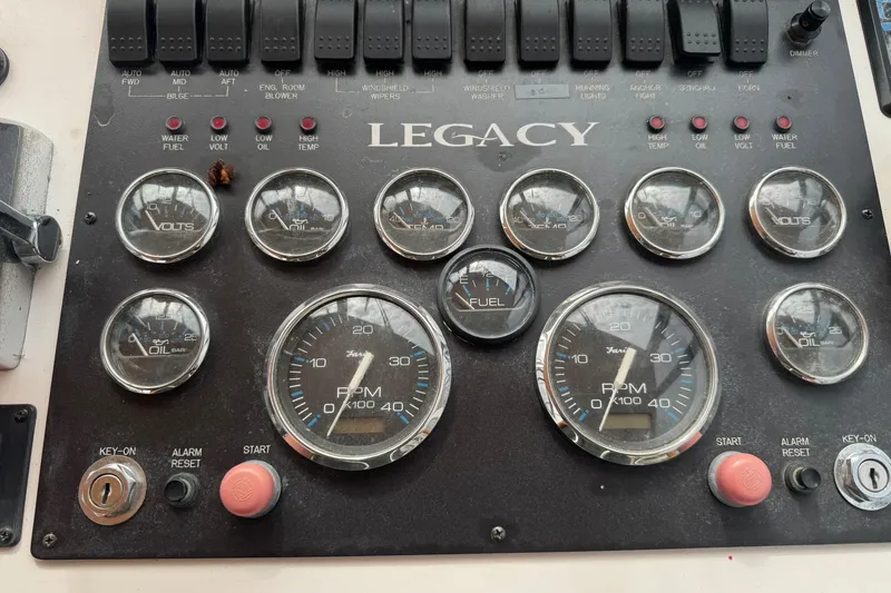Pilgrim Yacht Photos Pics Control panel of a 2001 Legacy Soft Top with various gauges and switches.