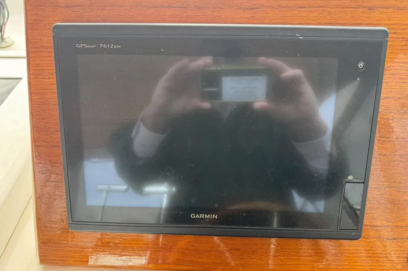 Pilgrim Yacht Photos Pics Garmin GPSMap 7612xsv on 2001 Legacy Soft Top boat dashboard.