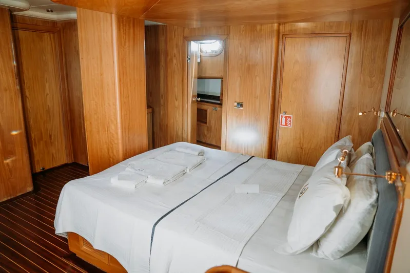  Yacht Photos Pics Luxurious wooden cabin interior of 2005 Custom Made Gulet yacht with double bed.