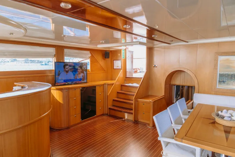  Yacht Photos Pics Luxurious interior of 2005 custom-made gulet with wooden decor and modern amenities.