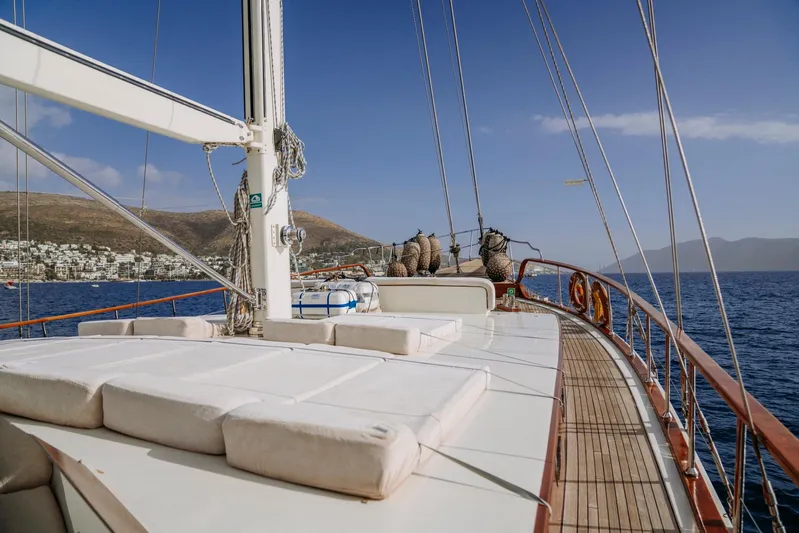  Yacht Photos Pics 30m custom-made gulet sailing on the sea, featuring spacious deck and scenic coastal views.