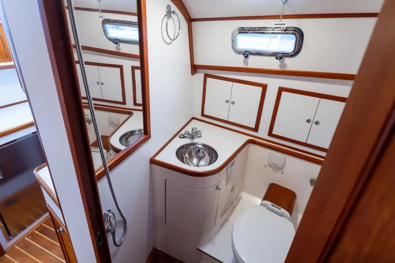 Peddler Yacht Photos Pics Luxurious 2007 Bruckmann BLUESTAR yacht bathroom with wood accents and modern fixtures.