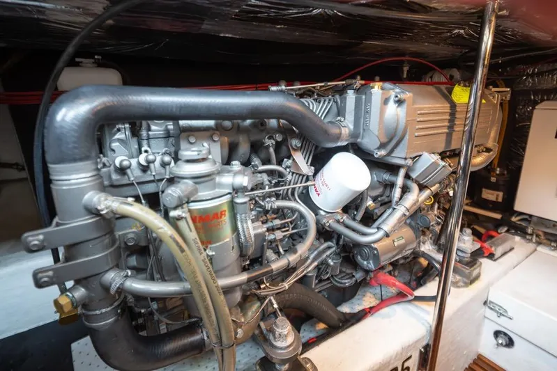 Peddler Yacht Photos Pics Engine room of 2007 Bruckmann BLUESTAR boat, showcasing detailed mechanical components.