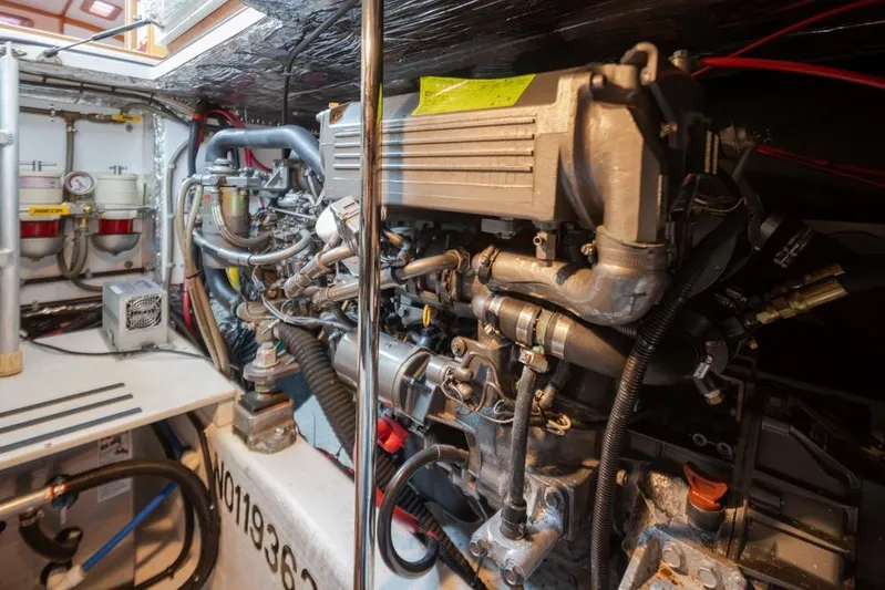 Peddler Yacht Photos Pics Engine room of 2007 Bruckmann BLUESTAR boat, showcasing complex machinery and components.