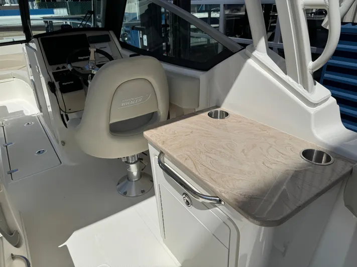  Yacht Photos Pics 2022 Boston Whaler 240 Vantage interior with helm and countertop.