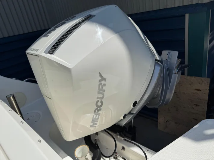  Yacht Photos Pics 2022 Boston Whaler 240 Vantage with Mercury outboard engine, close-up view.