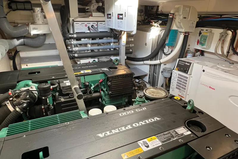 Kuramati III Yacht Photos Pics Engine room of a 2016 Prestige 500 yacht featuring Volvo Penta engines.