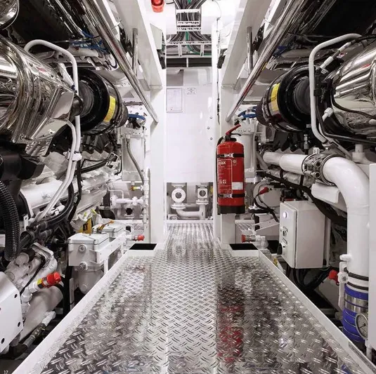 Excellence V Yacht Photos Pics Engine room of 2014 Feadship EXCELLENCE V yacht, featuring advanced machinery and safety equipment.