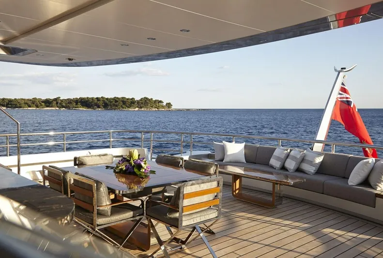 Excellence V Yacht Photos Pics Luxury yacht deck with dining area, ocean view; Feadship EXCELLENCE V, 2014 model.