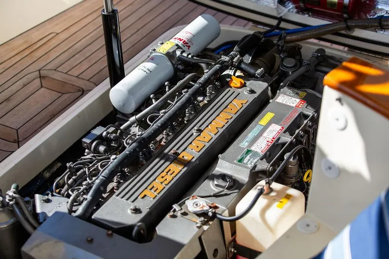 Firefly Yacht Photos Pics Yanmar diesel engine in a 2003 Hinckley T29R boat, showcasing detailed components.