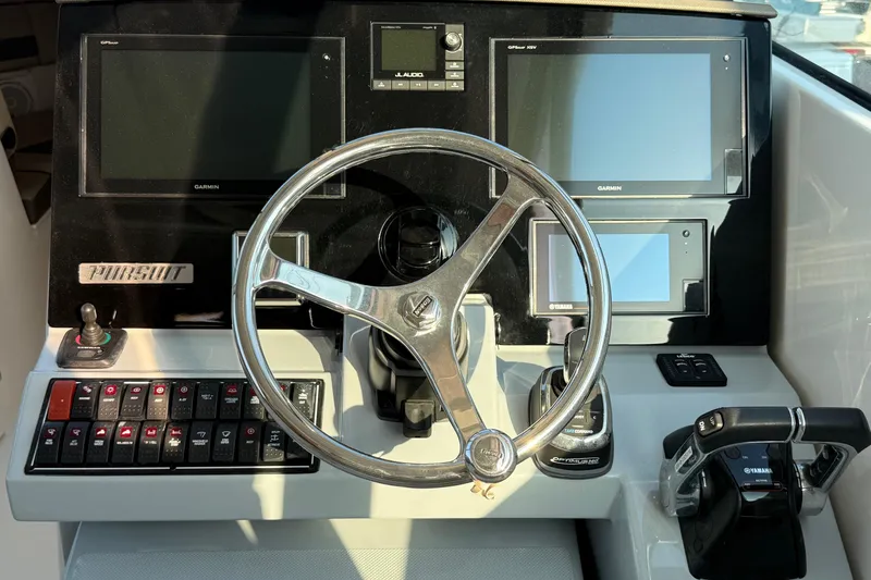  Yacht Photos Pics 2019 Pursuit DC 325 Dual Console helm with Garmin displays and Yamaha controls.