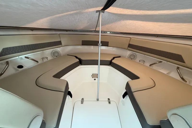  Yacht Photos Pics 2019 Pursuit DC 325 Dual Console interior with beige seating and modern design.